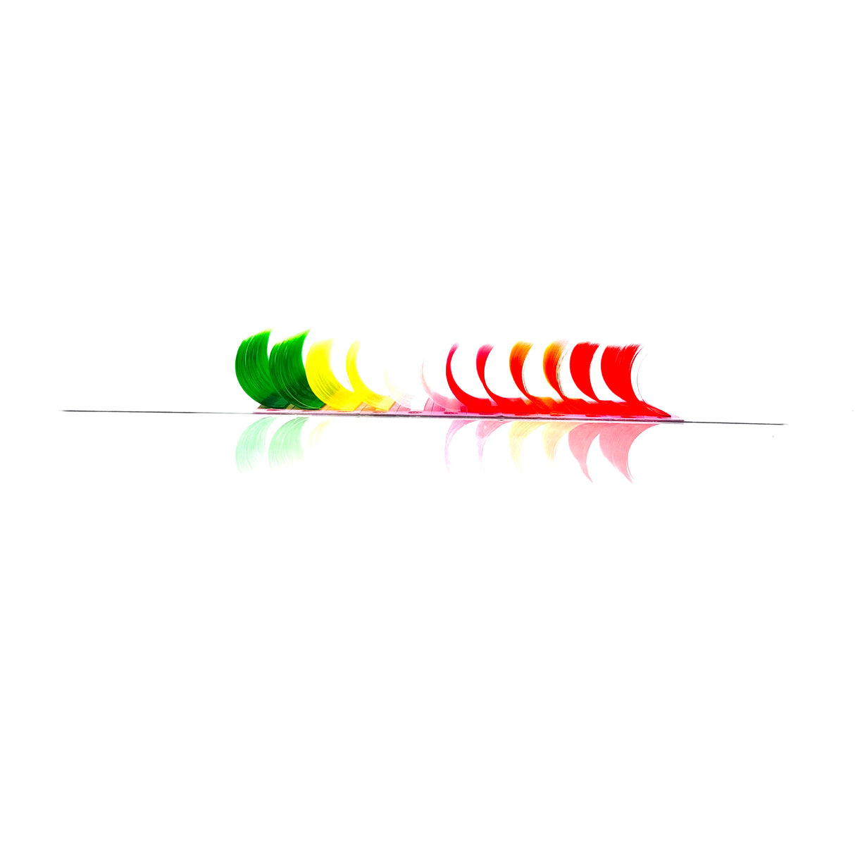 Side angle of Holiday Color Lash Tray showing layered multi-color lashes – CC curl .05 in 14–18mm lengths from Trish Co Side angle of Holiday Color Lash Tray showing layered multi-color lashes – CC curl .05 in 14–18mm lengths from Trish Co