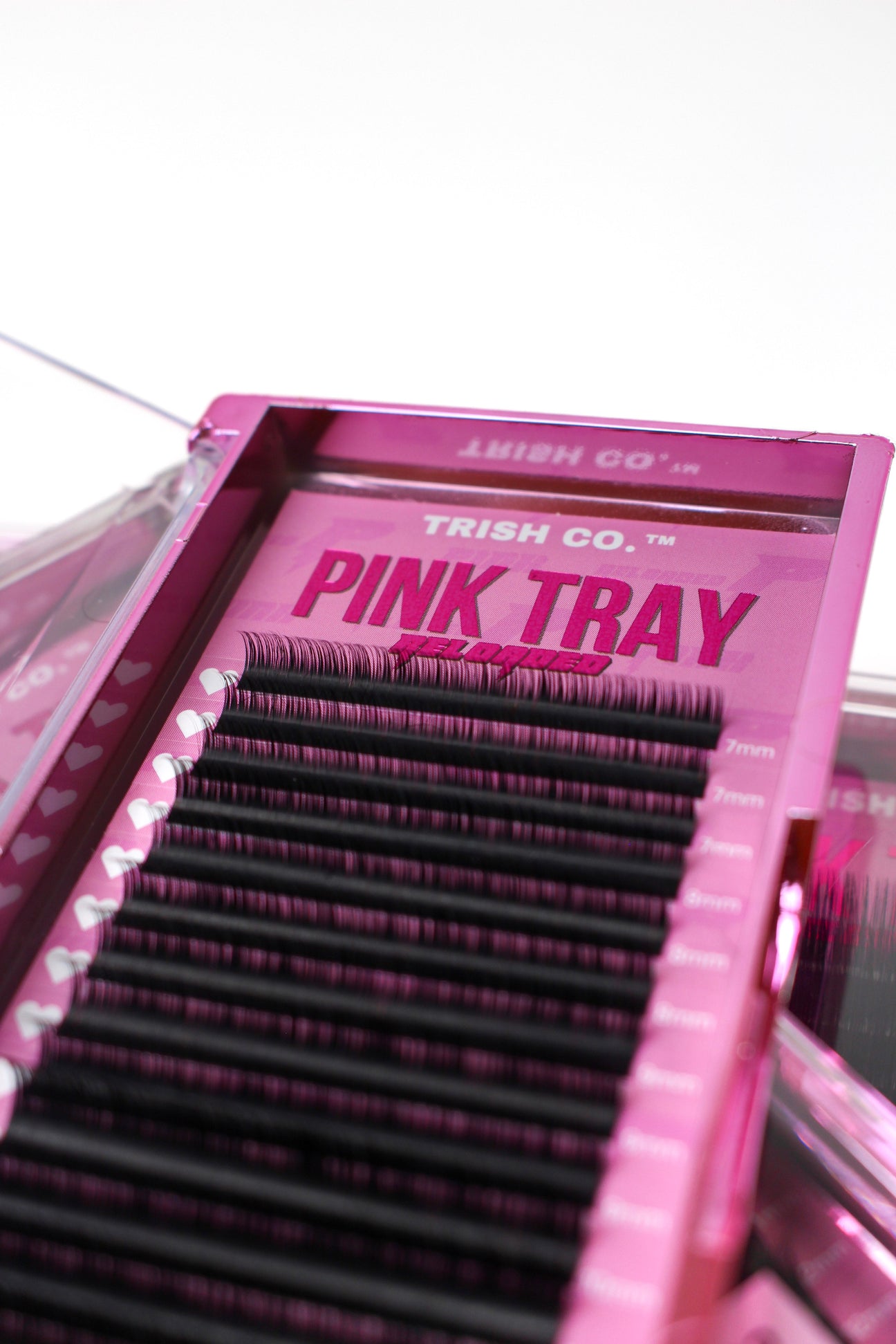 Front view of Reloaded Pink Lash Tray – ultra-fluffy matte black CC Curl lashes in signature Trish Co packaging