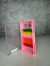 Colorful lash tray featuring CC curl .05 lashes in holiday shades – red, green, pink, white, and yellow – 14–18mm