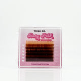 6-row tray of brown .05 CC curl lash extensions – Baby Pink Color Collection from Trish Co
